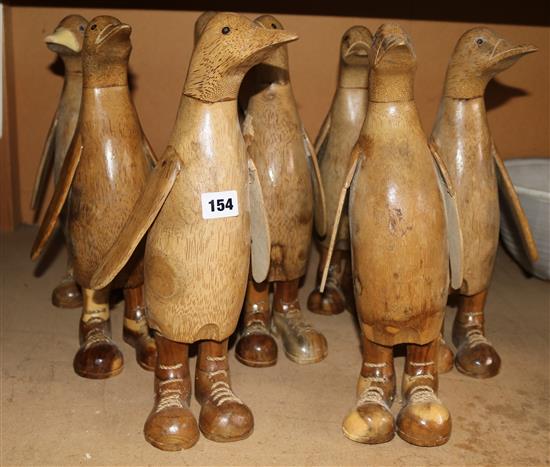 Collection of wooden penguins